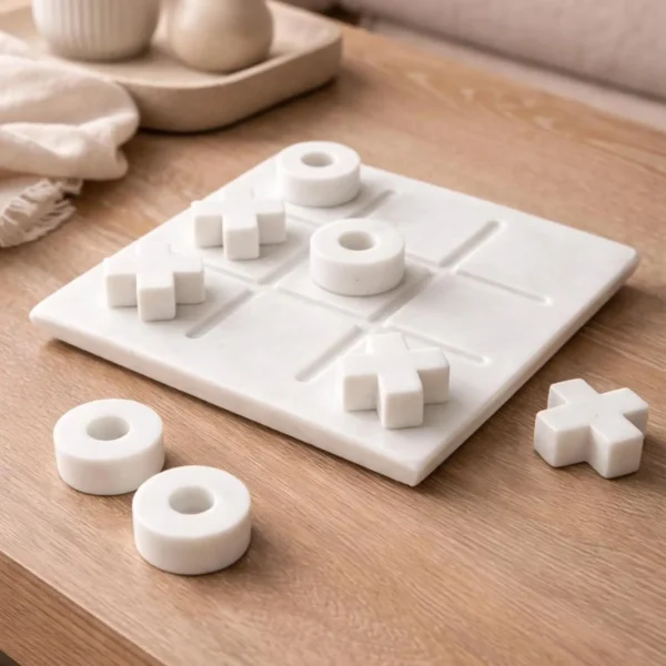 A minimalist white tic-tac-toe set